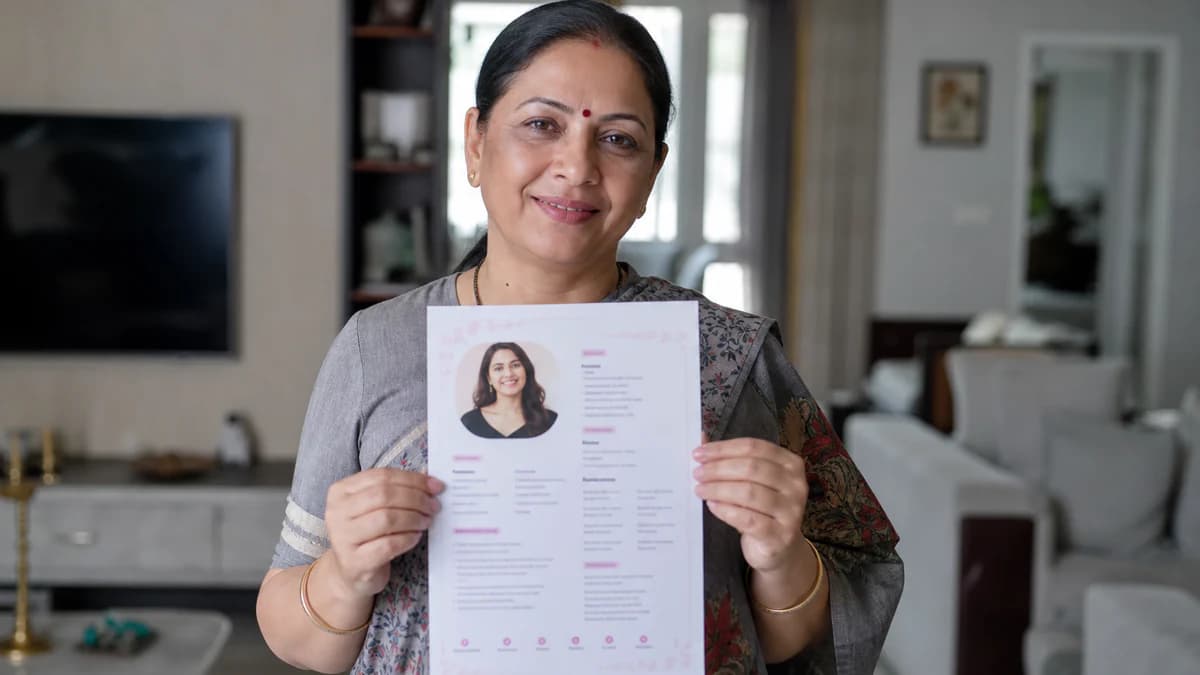 Mother holding a printed marriage biodata before sharing with family